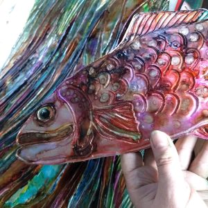 Embossed foil fish by artist Nicky Perryman